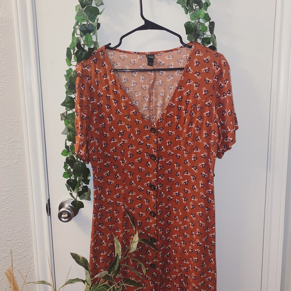 Pumpkin Colored Floral Dress. With Brown Buttons.